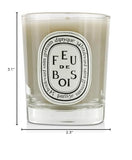 Bougie Diptyque Feu de Bois allumée, ambiance cocooning et détente