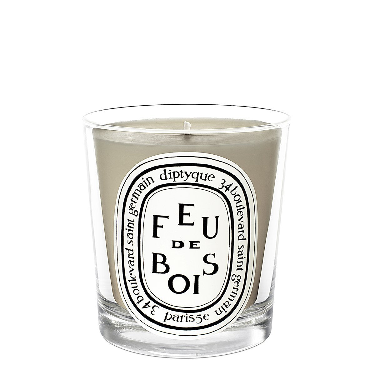Bougie Diptyque Feu de Bois mini, vue d’ensemble, parfum chaleureux qui réchauffe l’espace