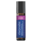 doTERRA Clary Calm – bouteille élégante sur table, soutien potentiel pendant le cycle