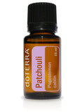 doTERRA Patchouli huile essentielle en application, favorise détente et équilibre émotionnel.