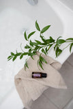 doTERRA Sauge Sclarée: gouttes dans flacon, usage précis pour massage relaxant.