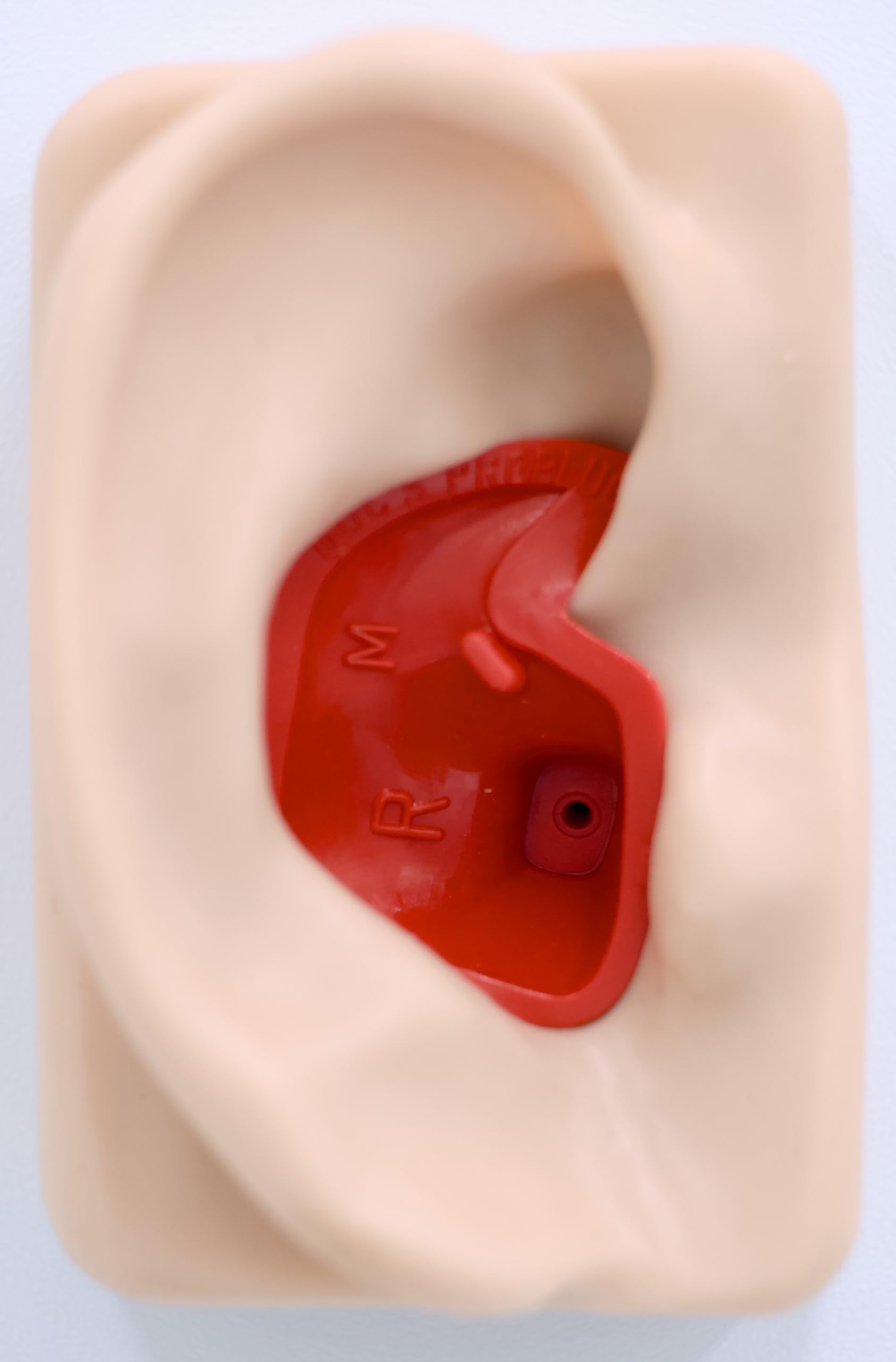 Doc’s Proplugs Medium dynaflex rouge : confort durable et protection contre l’eau froide.