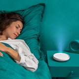 Dodow, boîtier portable noir prêt pour les voyages nocturnes.