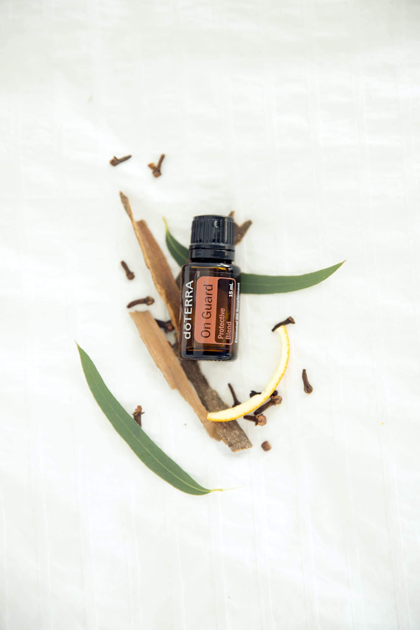Gros plan sur Wild Orange et les épices du mélange.