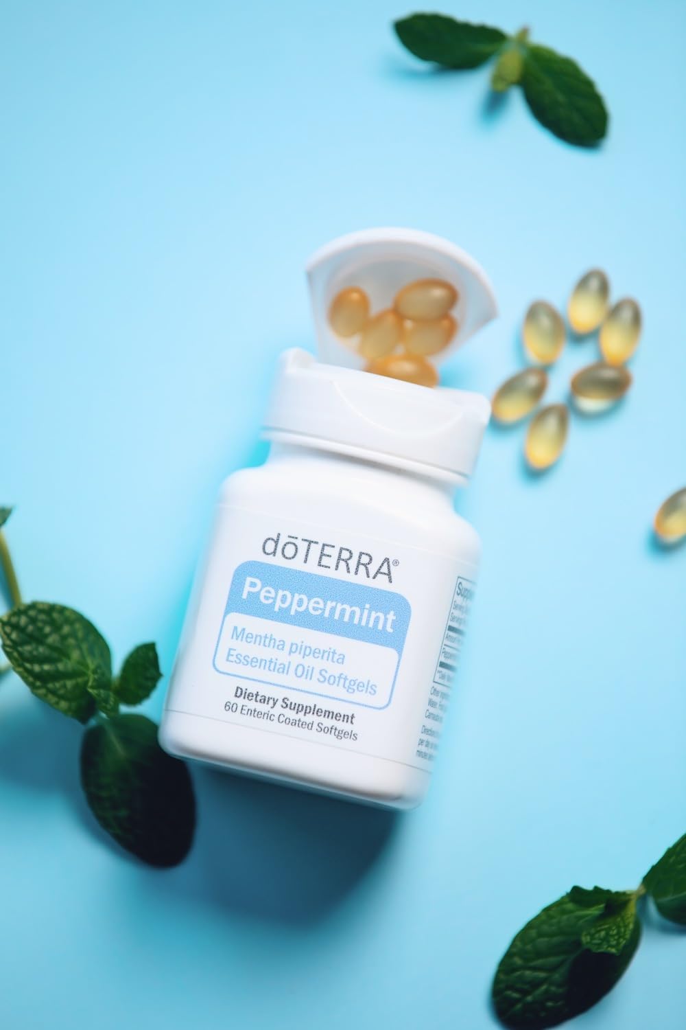 doTERRA gélules menthe-poivrée gros plan sur les capsules translucides