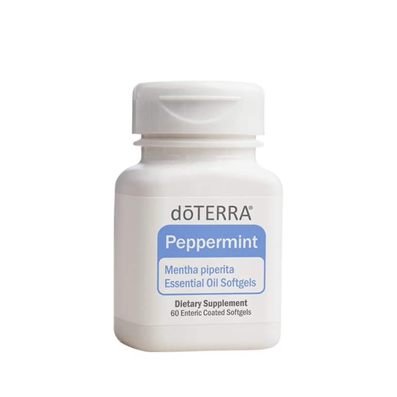 doTERRA gélules menthe-poivrée main tenant une capsule pour usage pratique