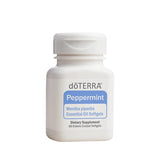 doTERRA gélules menthe-poivrée main tenant une capsule pour usage pratique