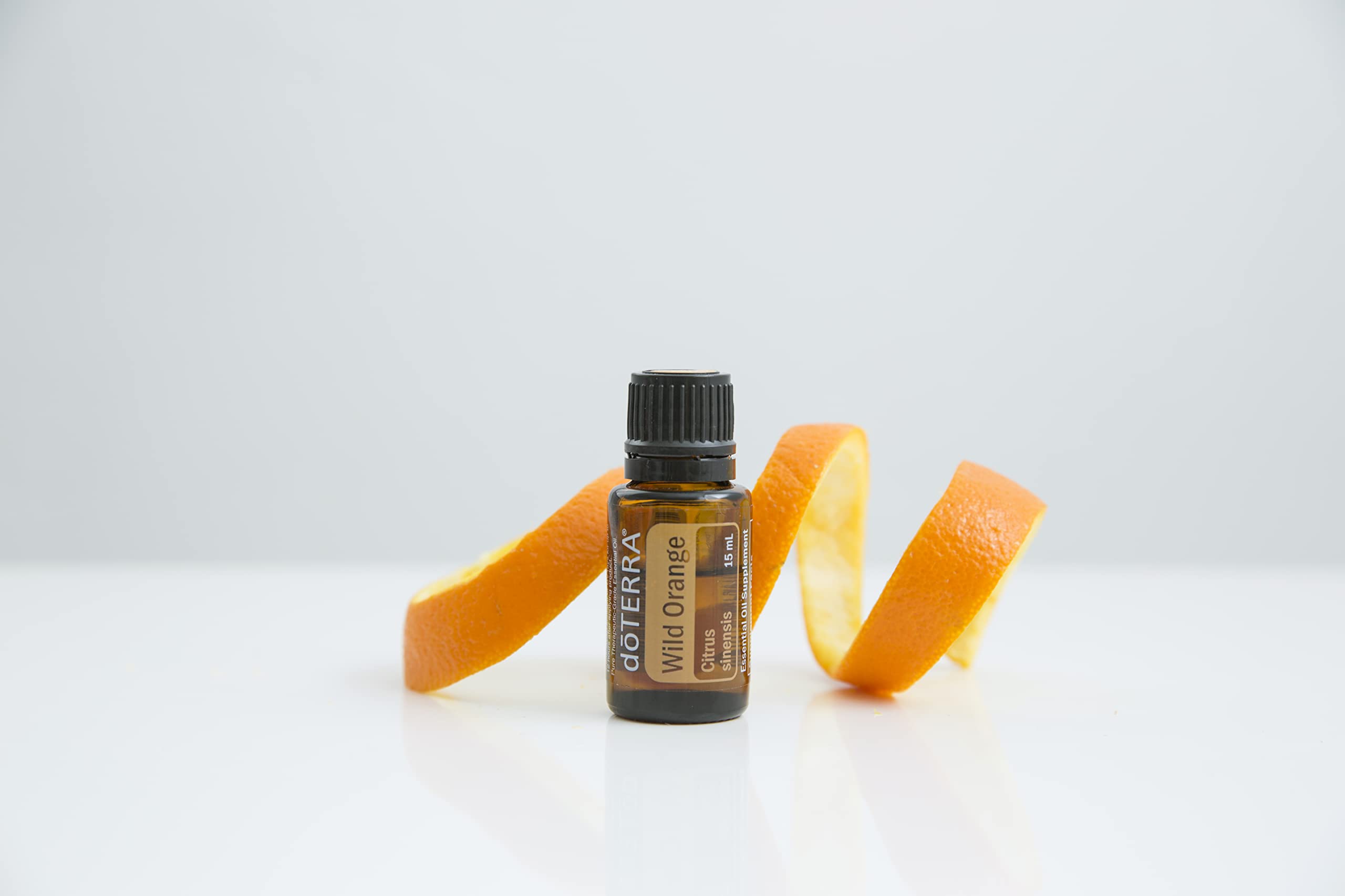 doTERRA Orange Sauvage, étiquette naturelle illustrant son authenticité et pureté