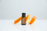 doTERRA Orange Sauvage, étiquette naturelle illustrant son authenticité et pureté