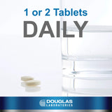 Ouverture du flacon Ultrazyme Douglas Laboratories pour une prise quotidienne.