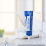 Ingrédients naturels visibles, All-One Dr. Bronner's dentifrice, formule douce et efficace.