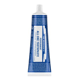 Dentifrice Dr. Bronner’s All-One Menthe dans sa bouteille, haleine fraîche au quotidien.