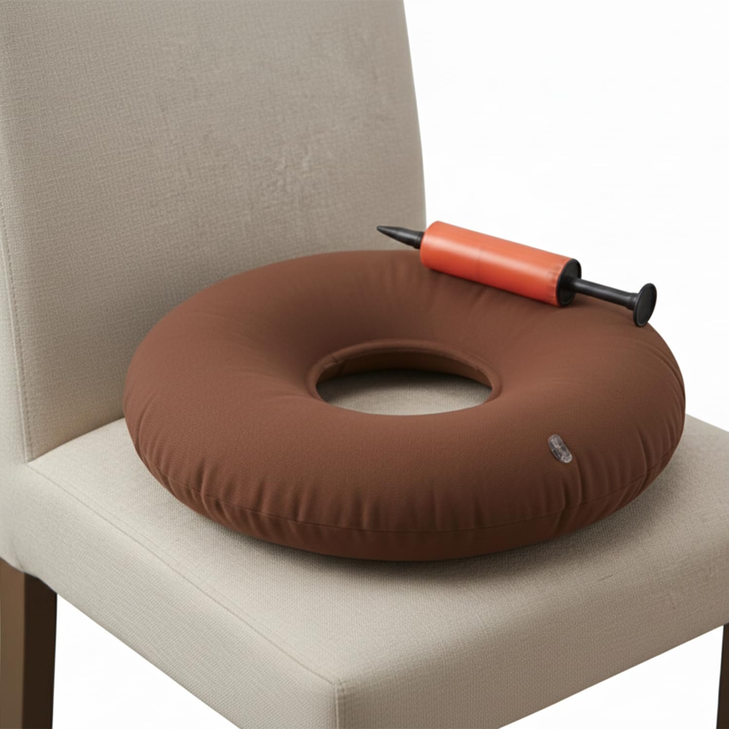 Dr. Frederick's Original oreiller-donut gonflable 15 pouces pour soulager le coccyx pendant les longues sessions.
