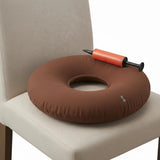 Dr. Frederick's Original oreiller-donut gonflable 15 pouces pour soulager le coccyx pendant les longues sessions.