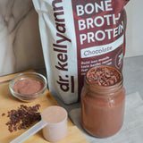 Dr. Kellyann ingrédients présents dans la poudre chocolat pour un apport nutritif.