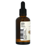 Application sur visage et cheveux avec l'huile d'argan Dr. Mercola, soin nourrissant.
