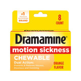 Dramamine, boîte comprimés à mâcher orange, pratique en voyage sans eau.
