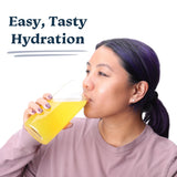 Tablette effervescente Drinklits se dissolvant dans l'eau pour une boisson légère.