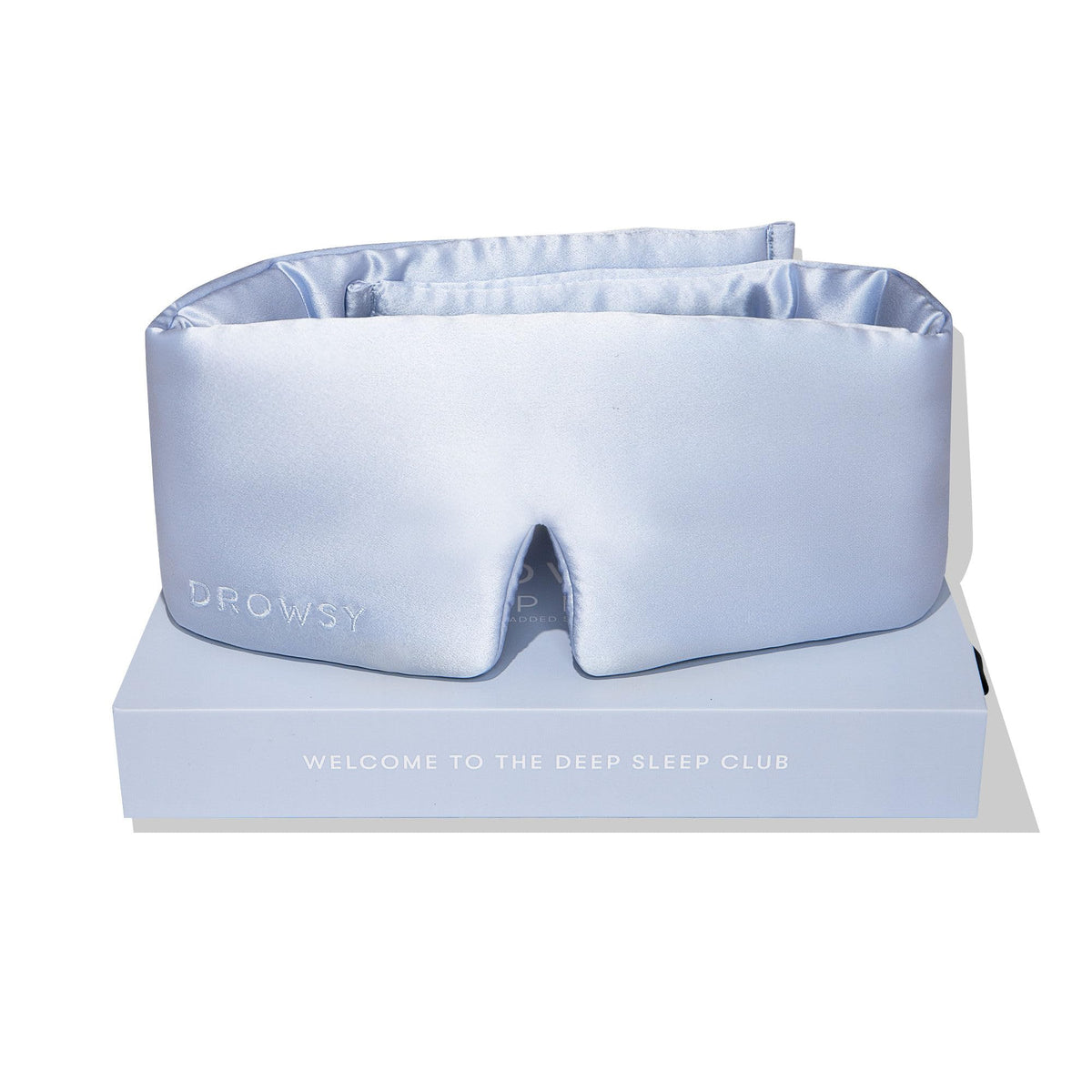 Masque Drowsy en soie enveloppant le visage en cocoon bleu bel.