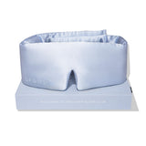 Masque Drowsy en soie enveloppant le visage en cocoon bleu bel.