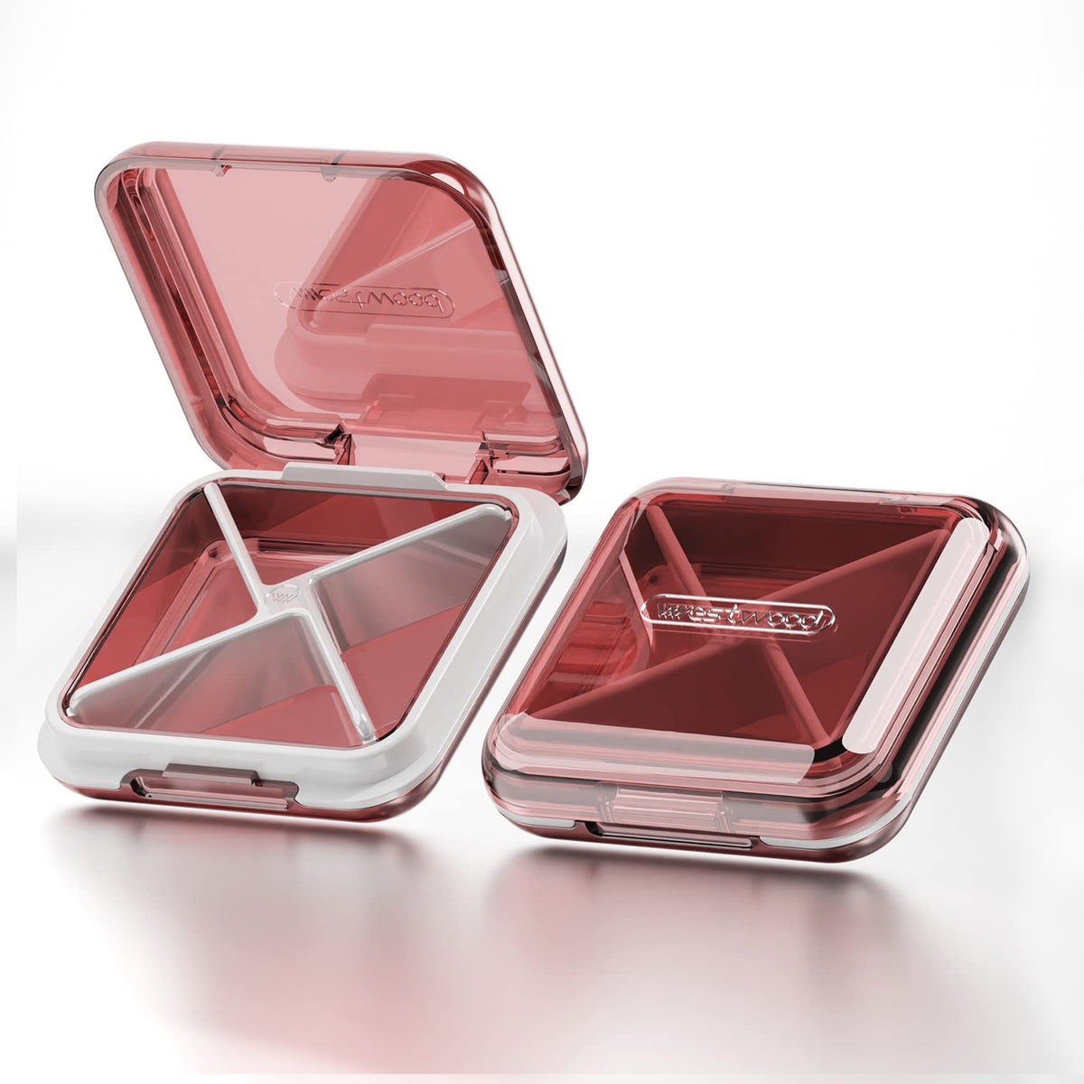Organisateur DUBSTAR rouge à quatre compartiments, pratique pour vos pilules quotidiennes.