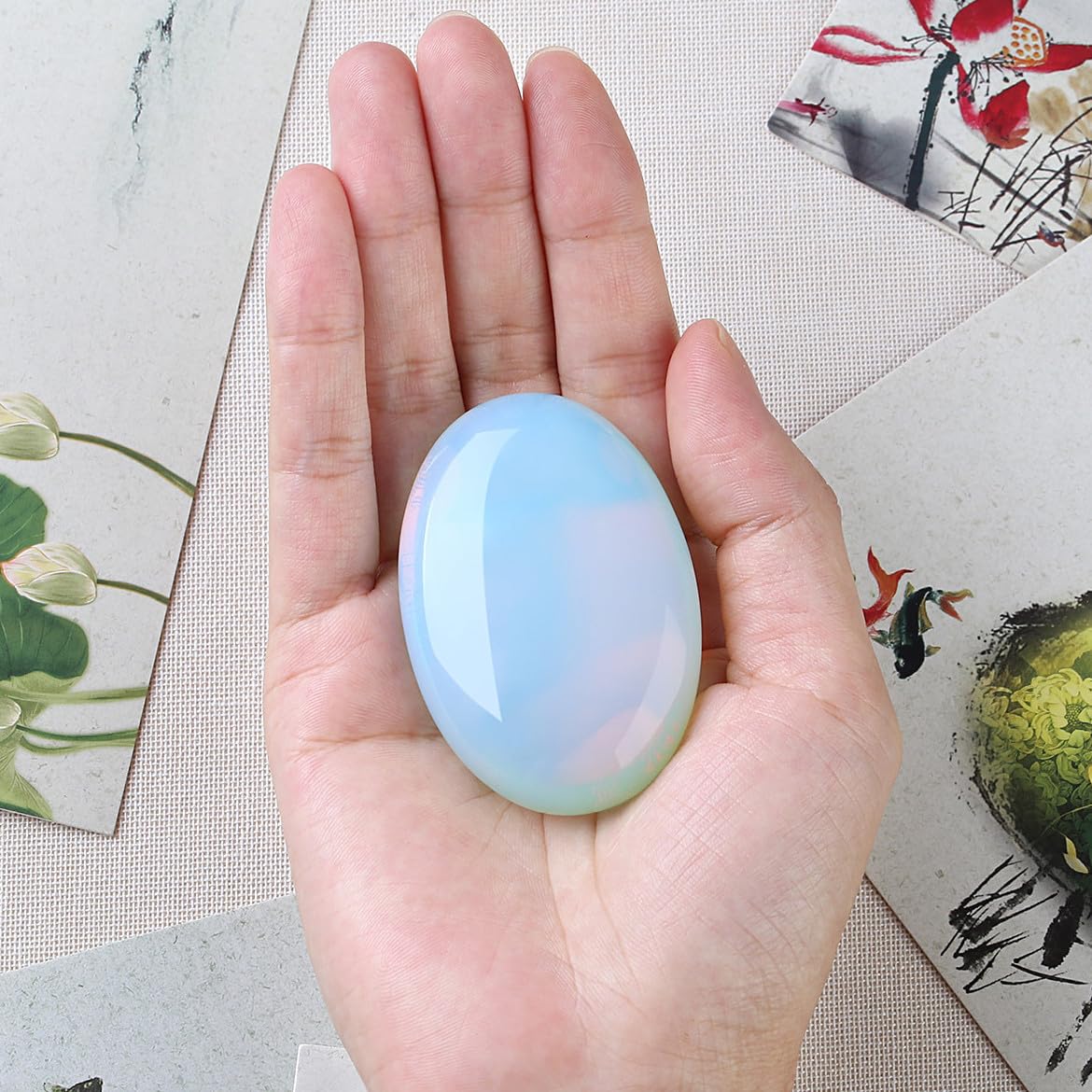 DUQGUHO Opalite palm stone détails d’emballage et couleur unique.