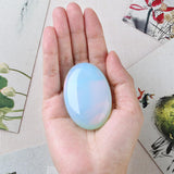 DUQGUHO Opalite palm stone détails d’emballage et couleur unique.