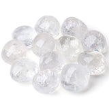 DUQGUHO quartz clair : galet brut dans vase décoratif et élégant.