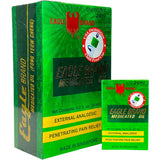 Huile médicamenteuse Eagle Brand – bouteille, utilisation pratique pour les douleurs musculaires.