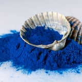 Ellie's Best spiruline bleue inodore, poudre facile à doser dans boissons protéinées.