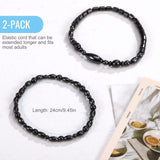 Coffret cadeau Emibele contenant deux bracelets-cheville en obsidienne noire.