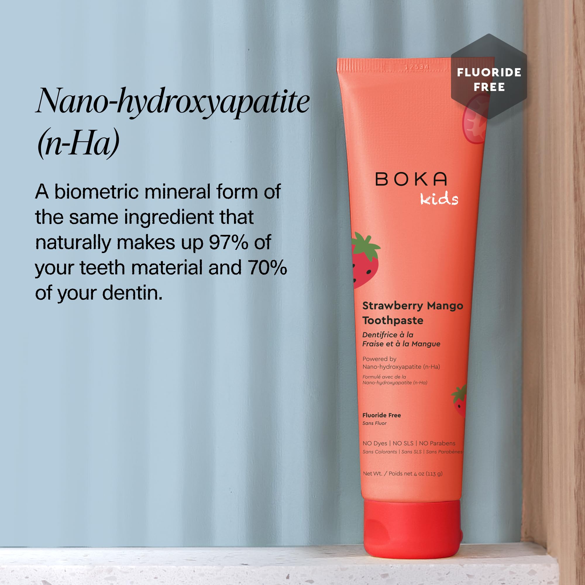 Enfant se brossant les dents avec Boka nano HA Fraise-Mangue.