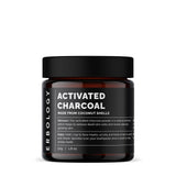 Erbology charbon actif en poudre sur la brosse à dents, blanchiment doux