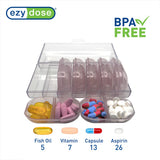 EZY DOSE: étui de voyage rose pour emporter vos pilules partout.