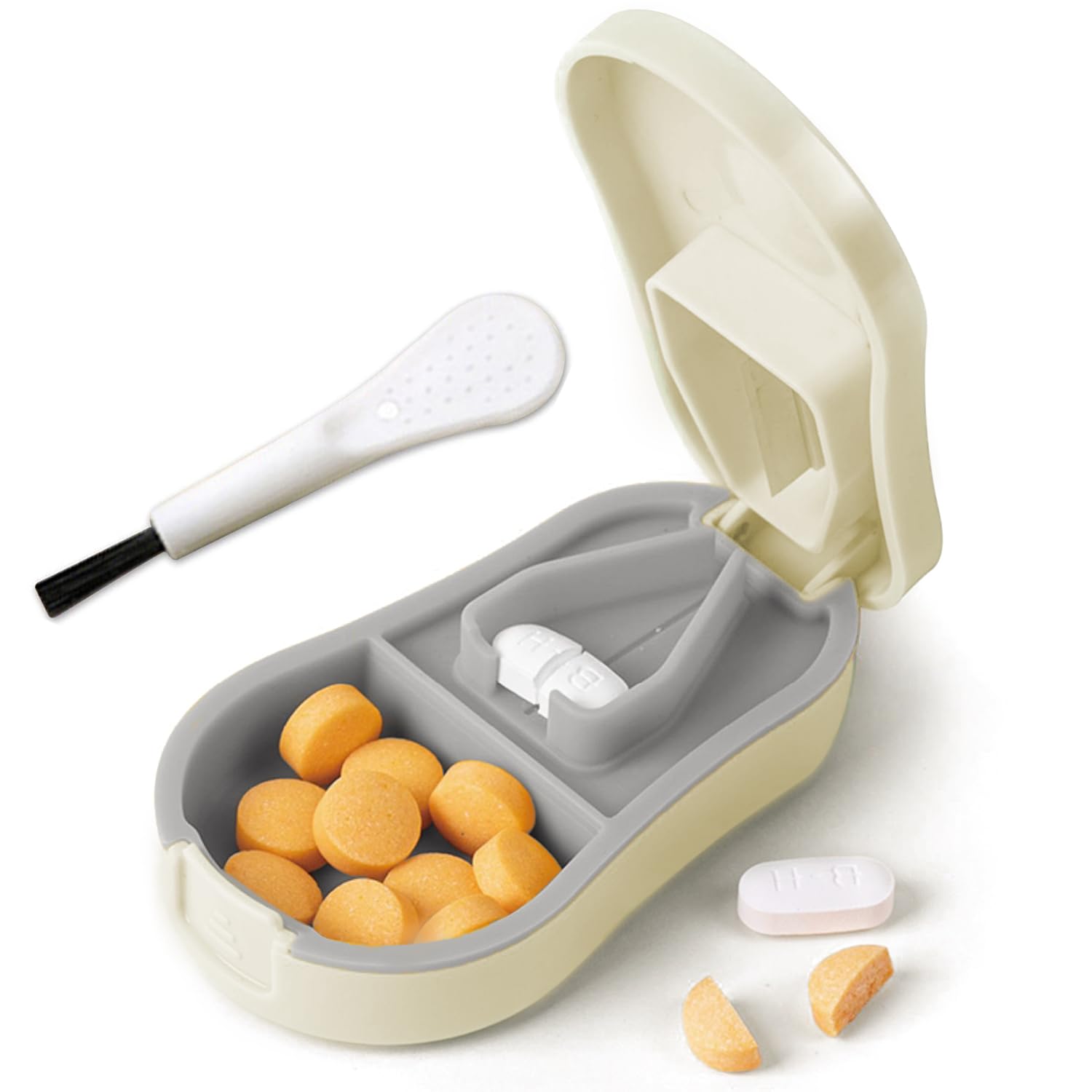 FANSTINOW coupe-pilules compacte montrant la prise en main et la gestion des petites pilules.