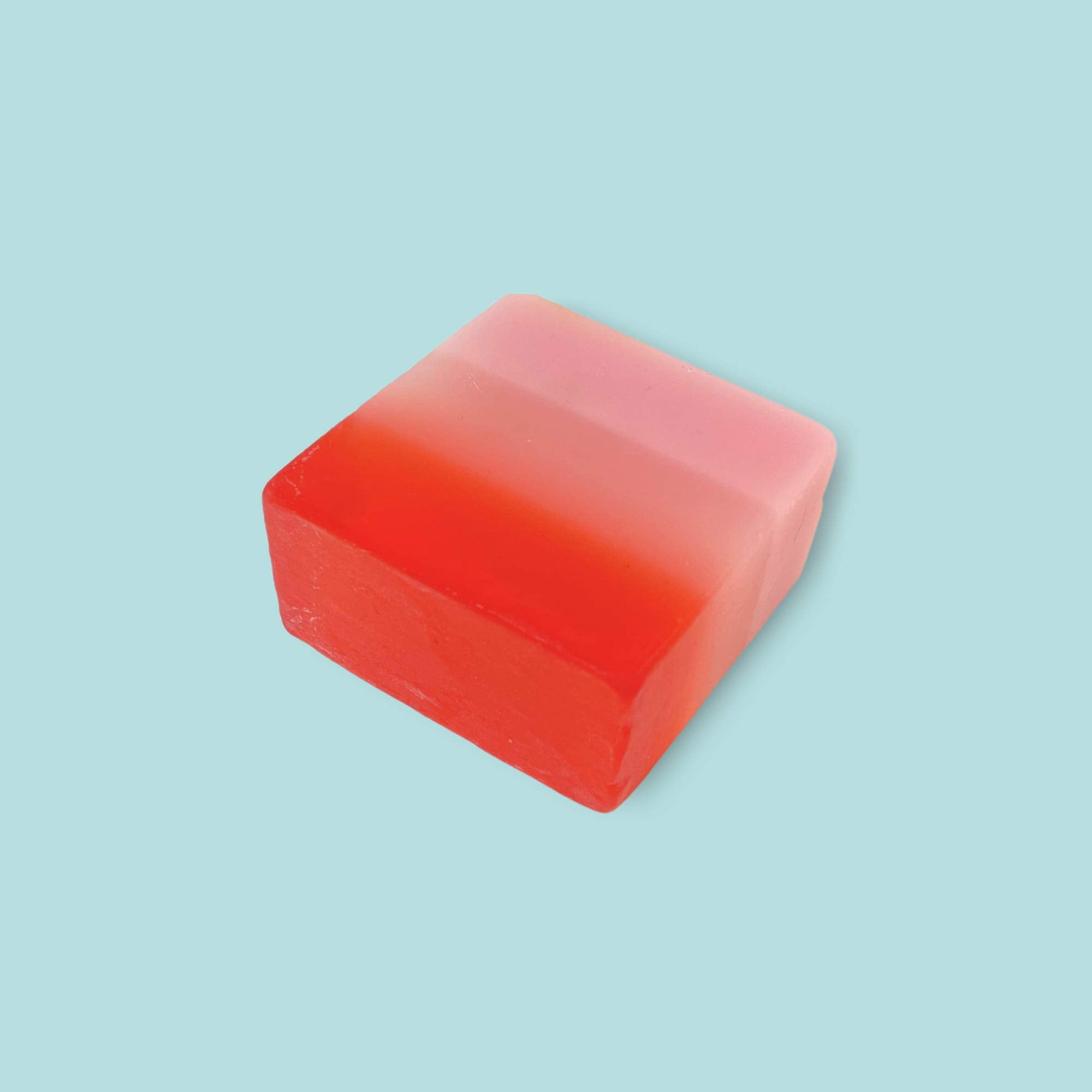 Fidelis Savon Yoni fraise, texture artisanale, soin délicat pour la zone sensible.