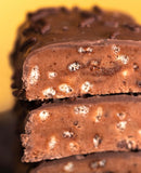 Barre protéinée Anabar, snack gourmand et pratique pour les déjeuners rapides.
