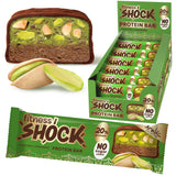 Barre protéinée FitnesSHOCK pistache chocolat noir, collation gourmande et rassasiante.