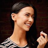 Flare Calmer Mini gris, design discret, idéal pour tolérer les bruits quotidiens.