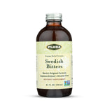 Flora Swedish Bitters – bouteille en verre, présentation premium et naturelle pour la digestion.