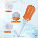 Foofoo Bouteille péri-postpartum orange avec bec inclinable pour un lavage ciblé.