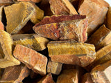 GAF TREASURES œil de tigre brut, pierre naturelle qui capte la lumière.