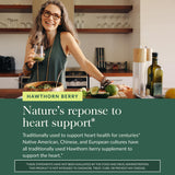 Gaia Herbs bottle open with capsules on spoon showing daily serving convenience