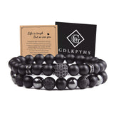 Bracelet GDLKPYHS en obsidienne noire pour homme, allure épurée et protection élégante.