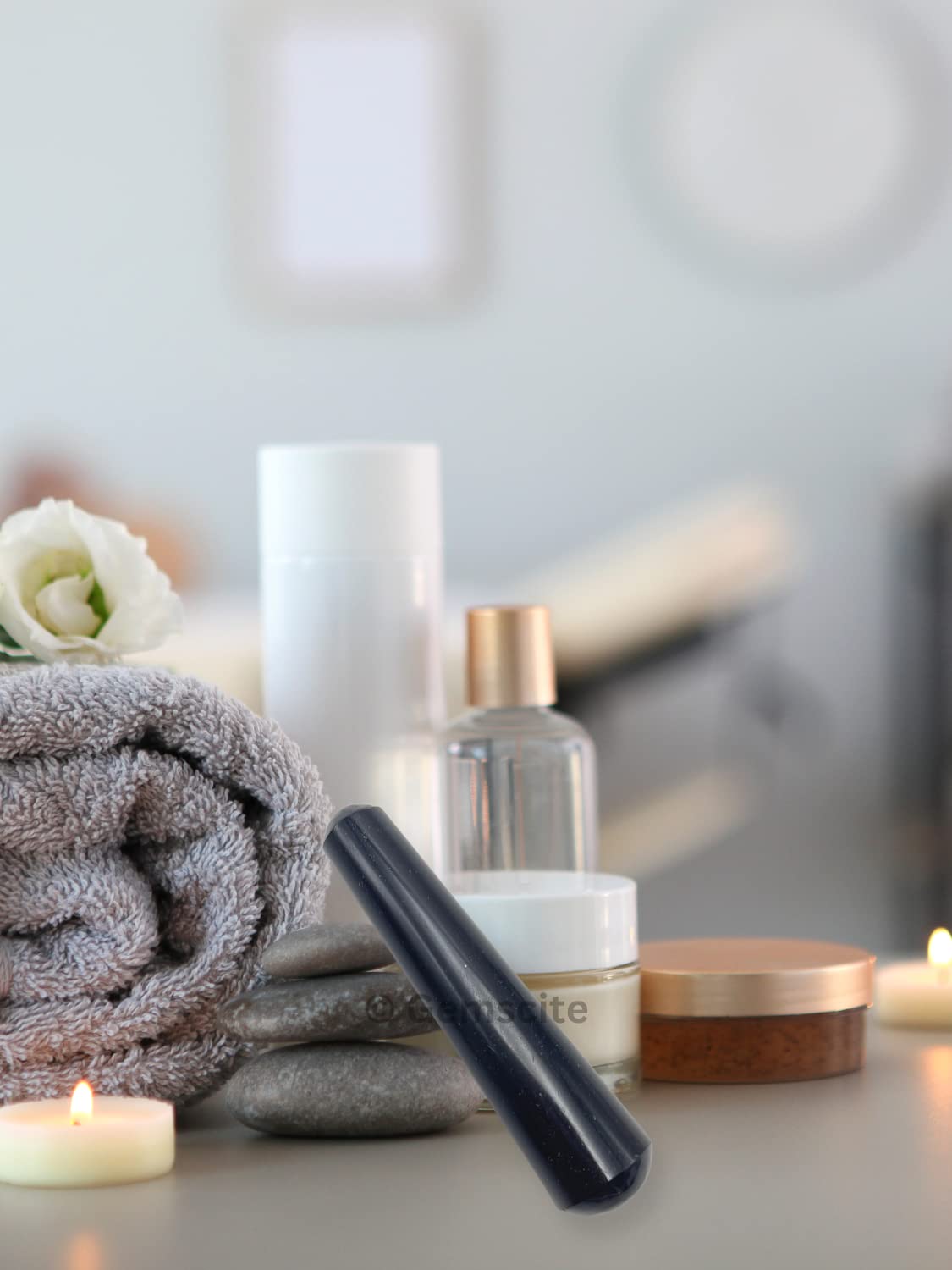 GEMSCITE bâton massage, activation du chakra racine lors de Kundalini Yoga.