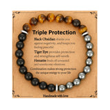 Bracelet Gnamy protection triple - perles hematite et oeil-de-tigre pour énergie et équilibre.