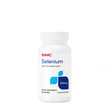 GNC Selenium 100mcg — boîte de comprimés végétariens, soutien des enzymes antioxydantes.