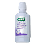 Bouteille Gum Ortho Anti-Plaque – fraîcheur mentholée et soutien de l’émail et des gencives.