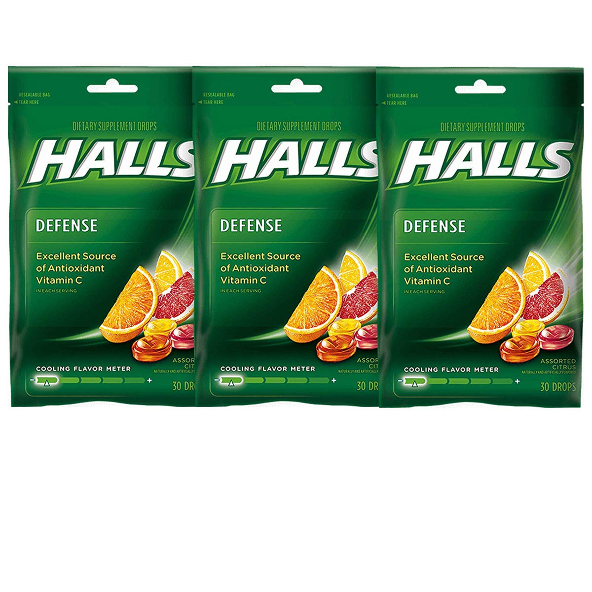 Gouttes HALLS Défense Vitamine C, saveurs agrumes, pratique en déplacement pour le quotidien.