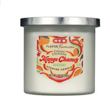 Bougie parfumée HEB Mango Chamoy dans verre givré avec couvercle, ambiance chaleureuse et parfum durable.